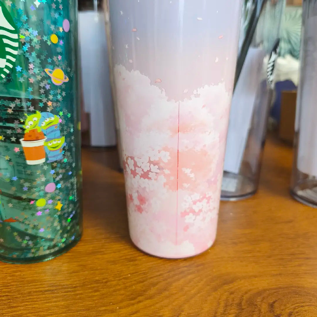 Starbucks Korean green sippy cup and defective stainless steel cup as second picture