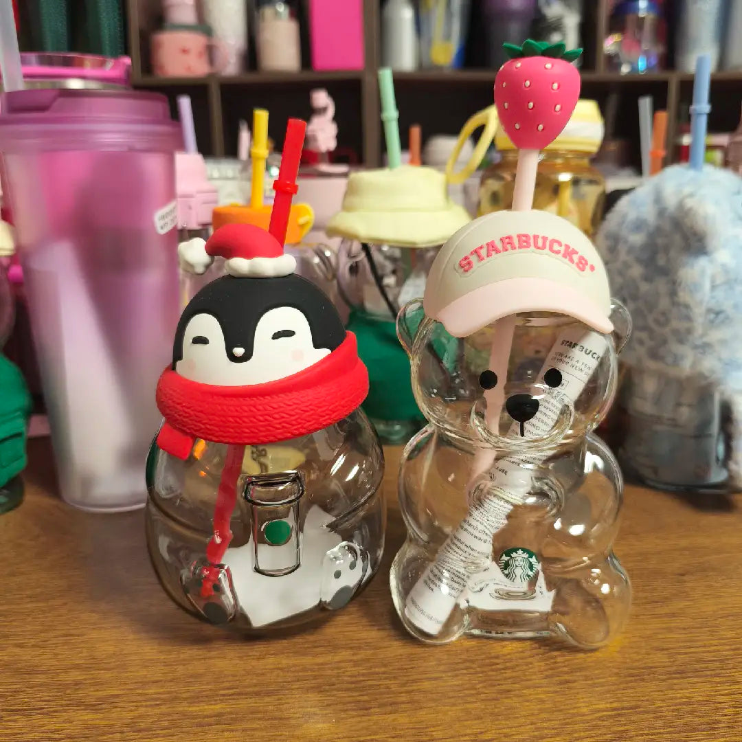 Starbucks Penguin Glass and Strawberry Glass with a tiny flaw - two glasses