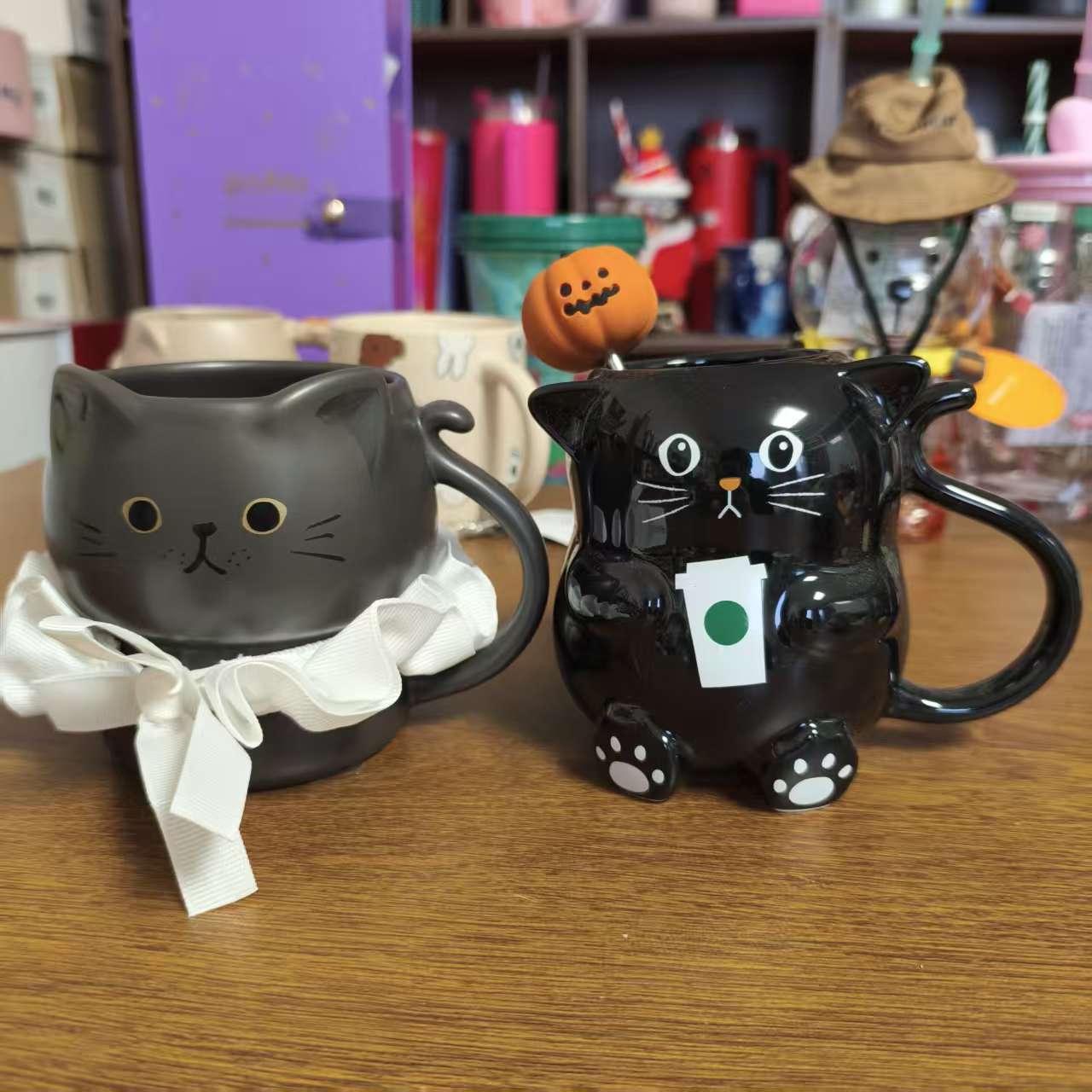 Starbucks two cat-shaped mugs