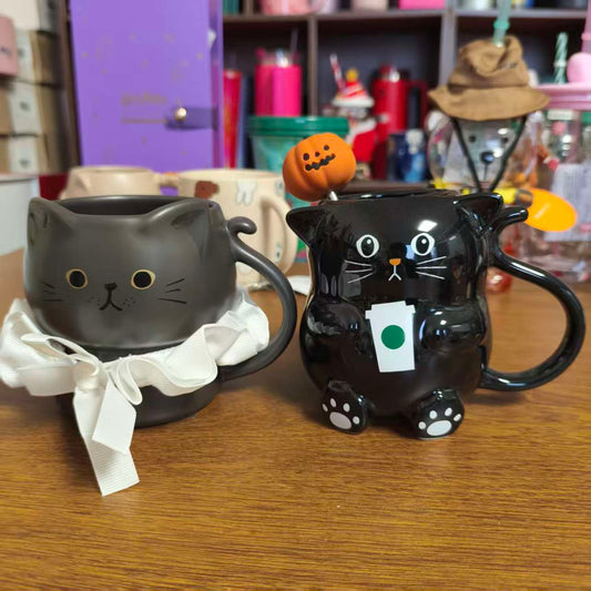 Starbucks two cat-shaped mugs